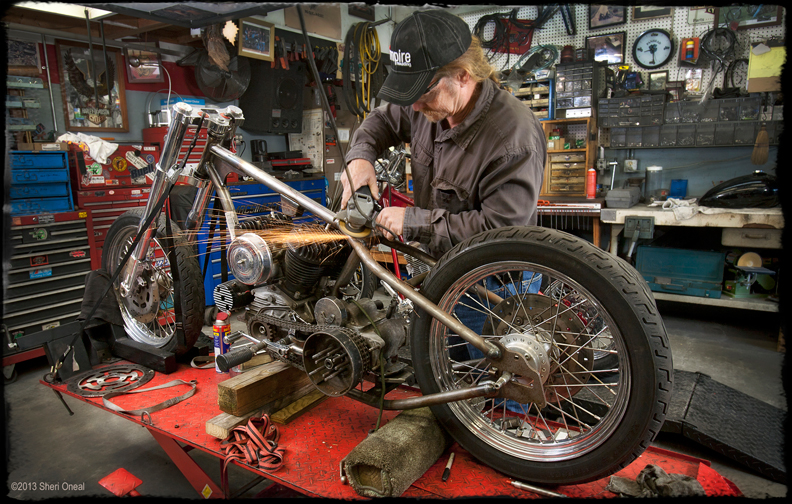 A man working on a Harley Davidson motorcycle for Made in America blog series