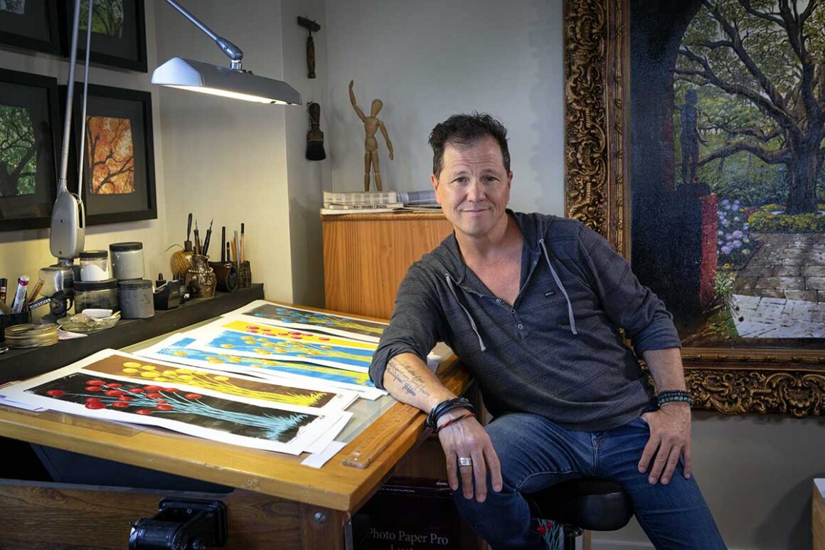 Terrell Thornhill at drafting table in his art studio