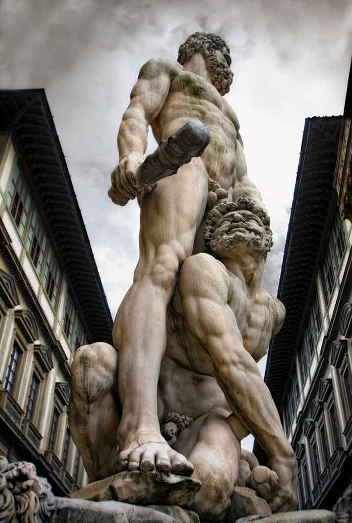 A Large Marble Statue Of Two Nude Men Fighting In Rome Italy