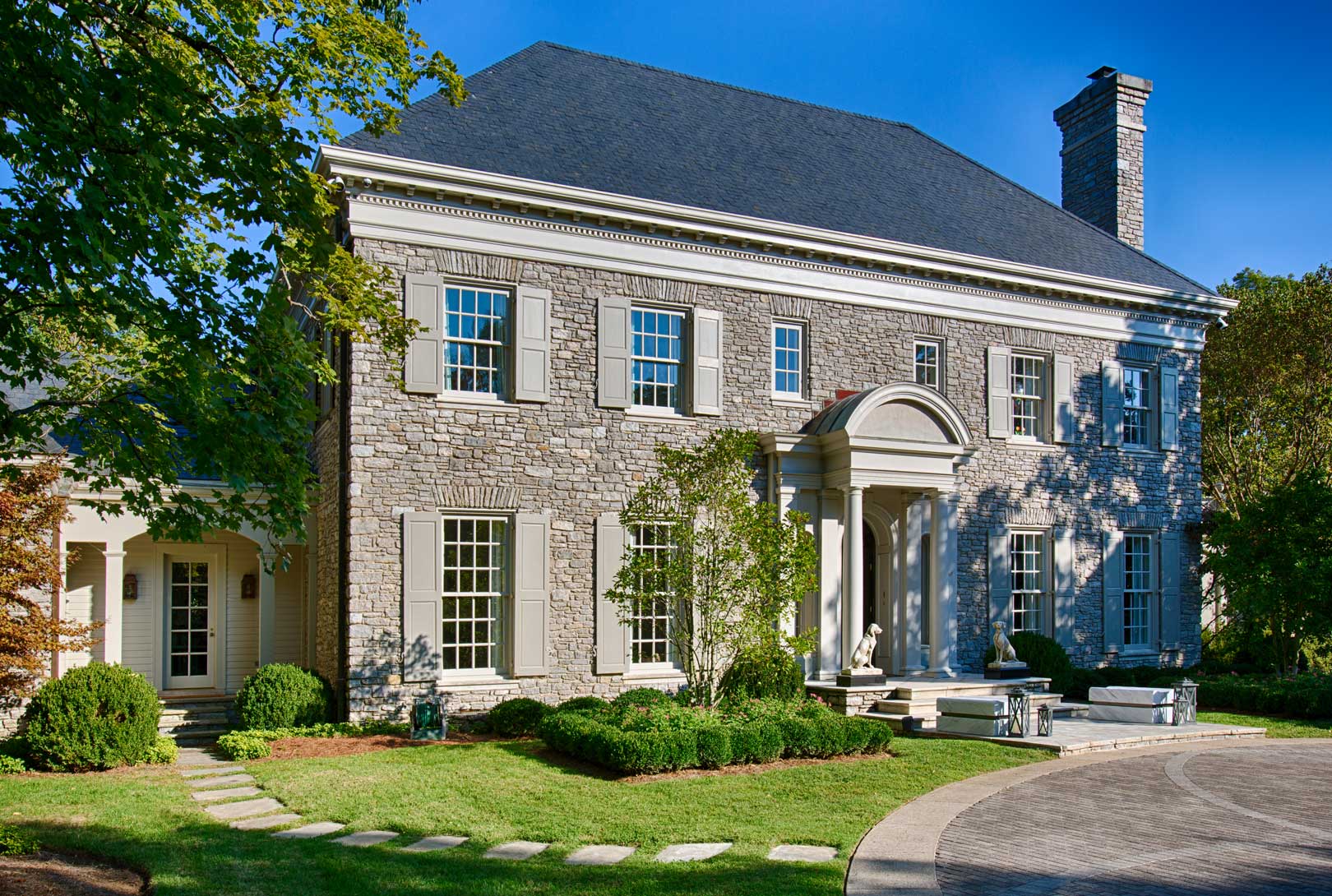 The Front Of A Two-Story Stone Home Renovation In Tennessee