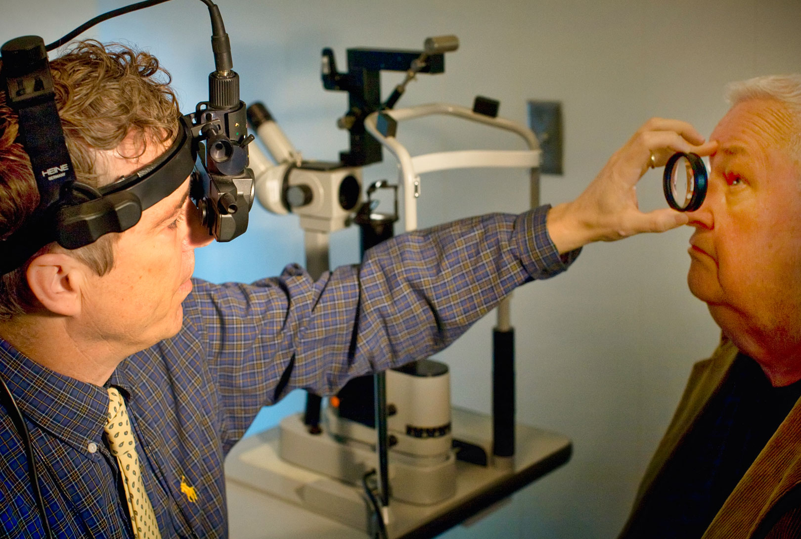 Ophthalmologist Rand Paul working in his clinic with a patient in his Kentucky clinic