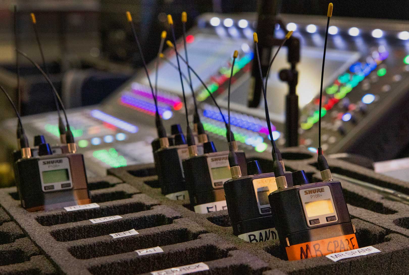 Shure Audio Monitors In A Dock At A Live Concert