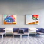 modern blue and gray seating area with Nashville art on the walls