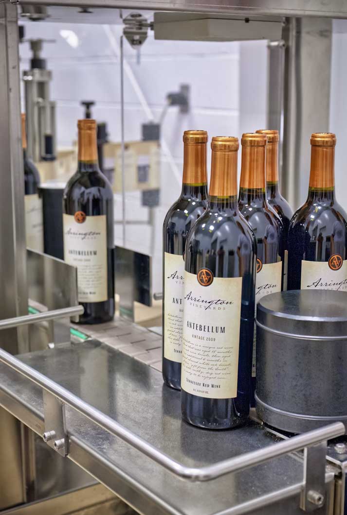 Arrington Vinyard Antebellum wine bottles coming out of packaging machine