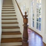 staircase with oak wood railing