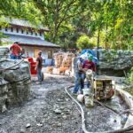 crew mixing and blowing concrete to form rock entry area of Pudu at Nashville zoo