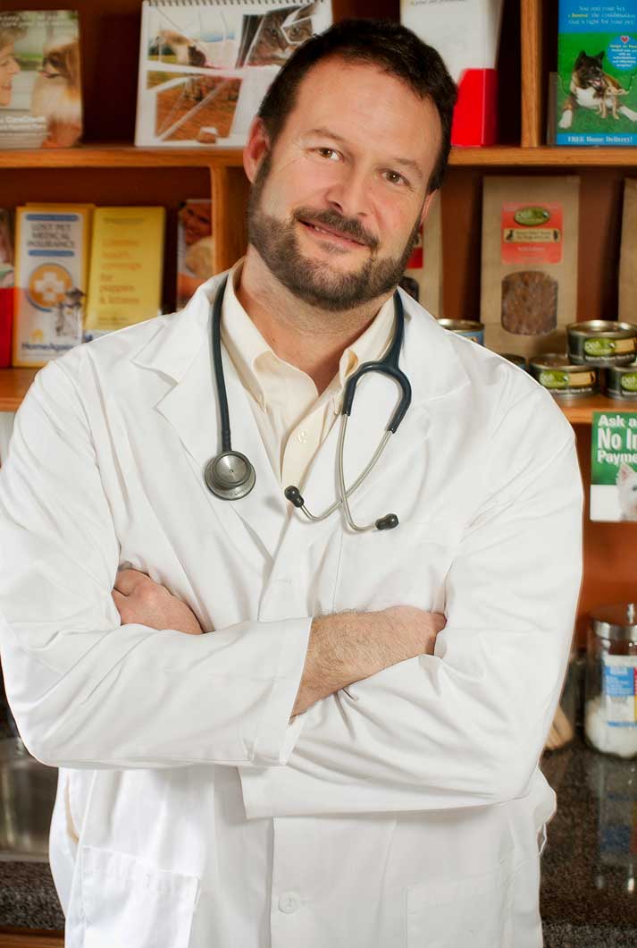 Veterinarian Marc Smith in a lab coat PET TAO pet products Natchez Trace Veterinary Services office