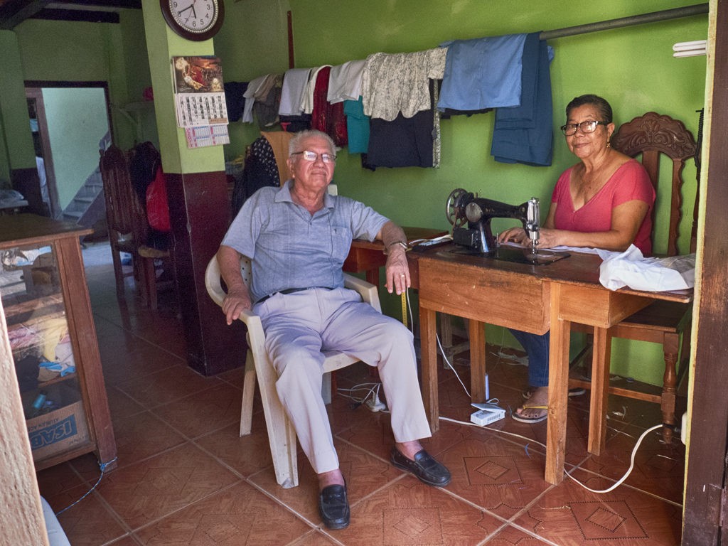 Local couple in their store in the small town of Canoa, Ecuador.