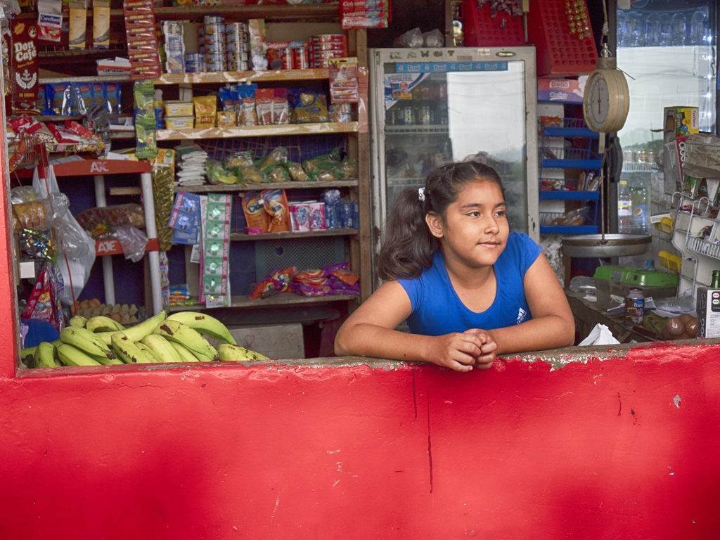 Girl in store, Bahía de Caráquez, Ecuador.