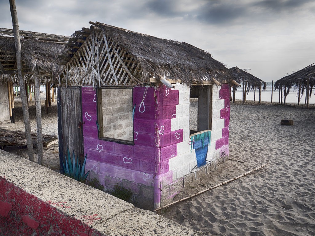 Images of the Canoa, Ecuador town, beach and locals.