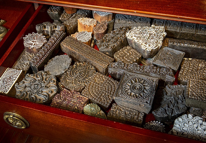 A drawer of century old hand carved wooden blocks from India