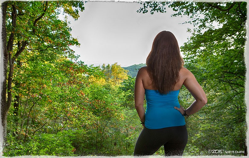 Fabulous Women over 40, Payge McMahon, adventure athlete and yoga instructor at Percy Warner Park looking out over the trails through the trees from above